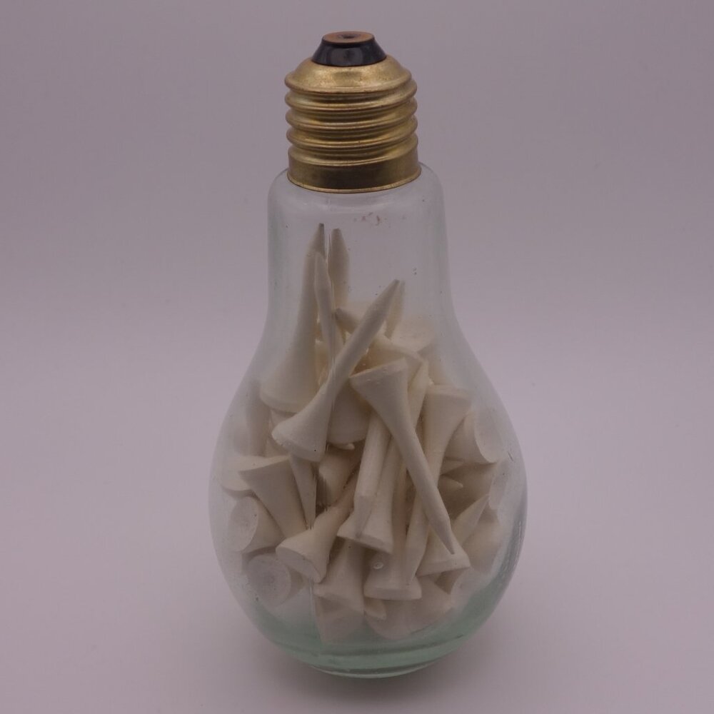 Decorative Light Bulb with Golf Tees in it